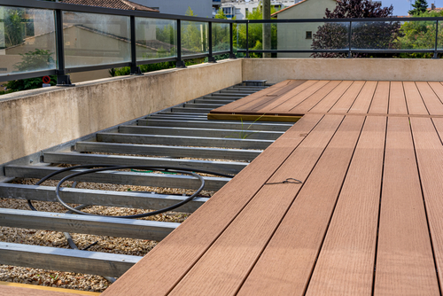 an outdoor deck being installed a residential home